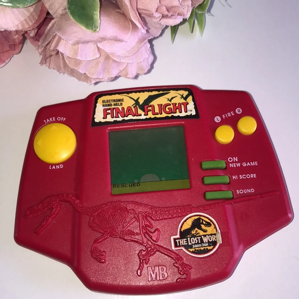 Jurassic Park The Lost World Electronic Hand Held Game 1996 Milton Bradley VTG
